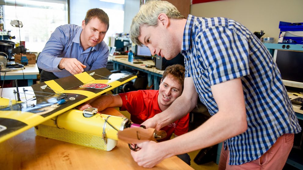 Bryant, Weisler and Stewart (from left to right), with a prototype of the EagleRay.