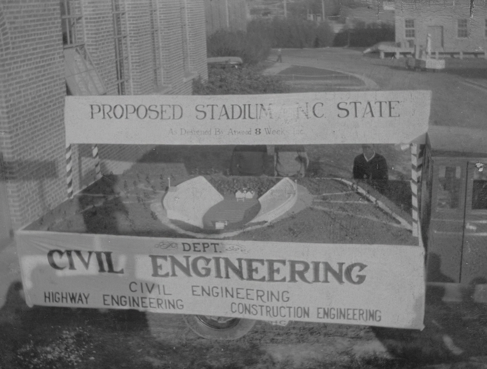 1931 image of truck with model of then proposed NC State stadium on truck bed