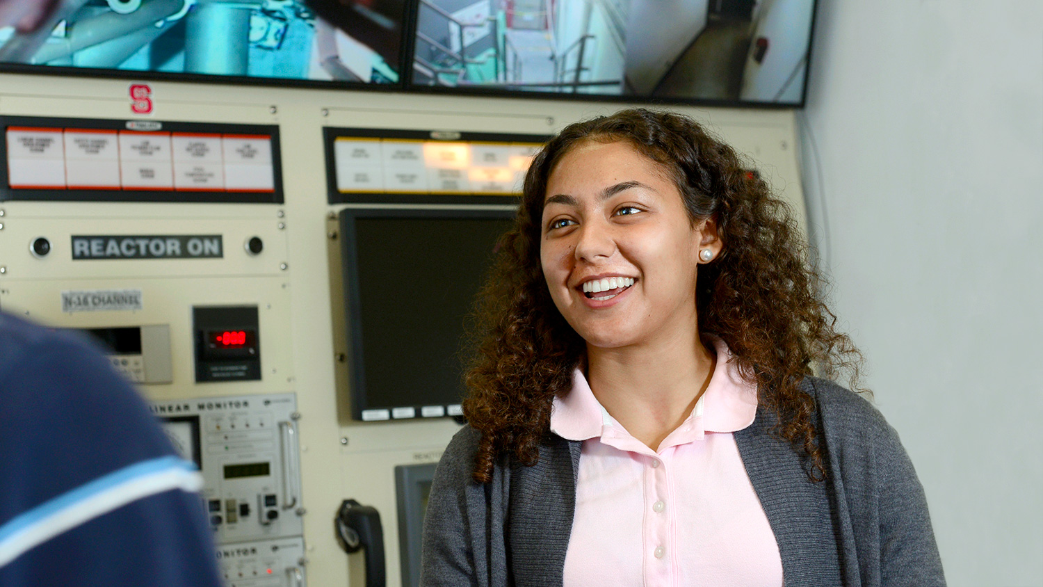 Jasmin Alsaied, a sophomore nuclear engineering student, works in nuclear reactor at Burlington Labs.