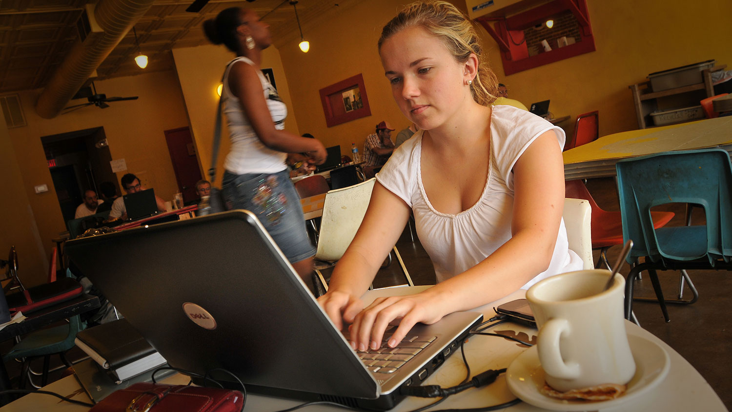 Student studies for an exam at Cup-a-Joe's on Hillsborough Street.