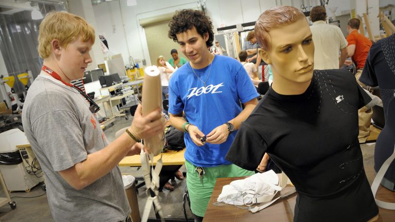 College of Textiles students work on a project in the textile engineering lab.