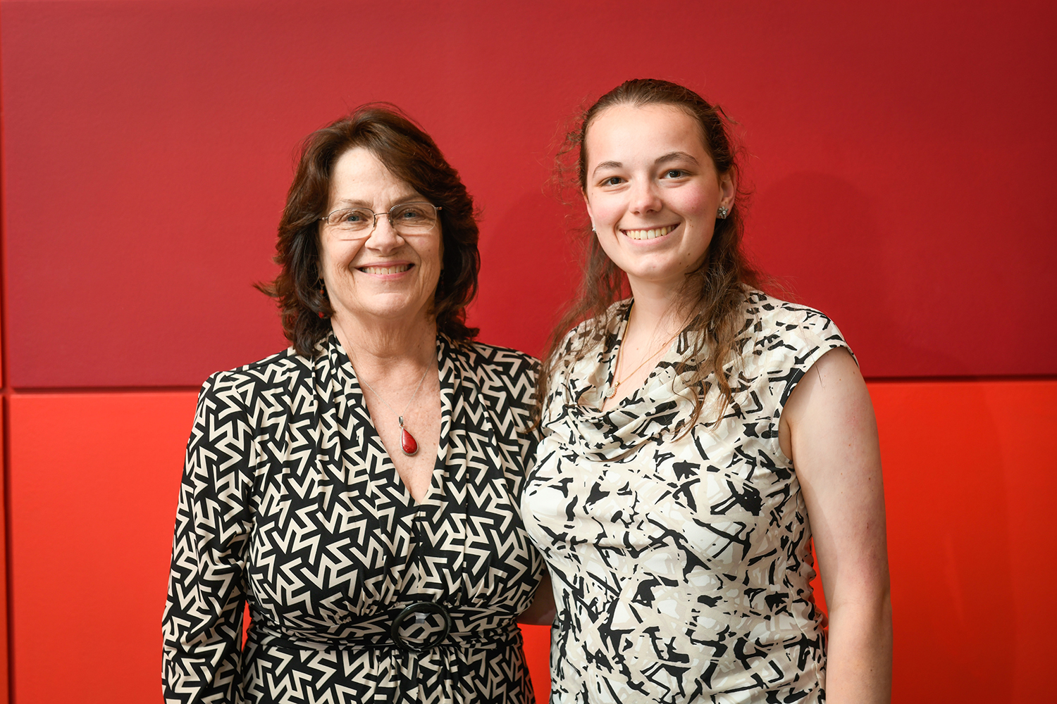 Suzanne Gordon, president of the NC State Engineering Board of Directors, meets with a scholarship recipient at the 2019 Engineering Annual Endowment Dinner.
