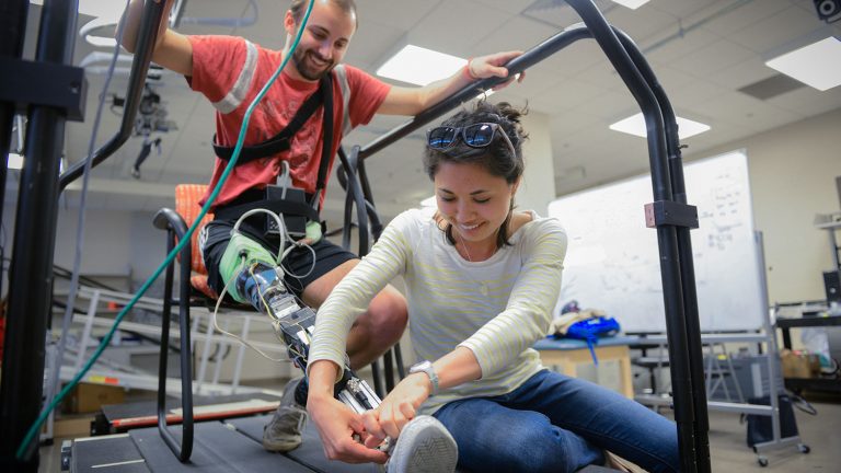 Andy Brandt (right) works with lab volunteer and MAE student Charles Humphries